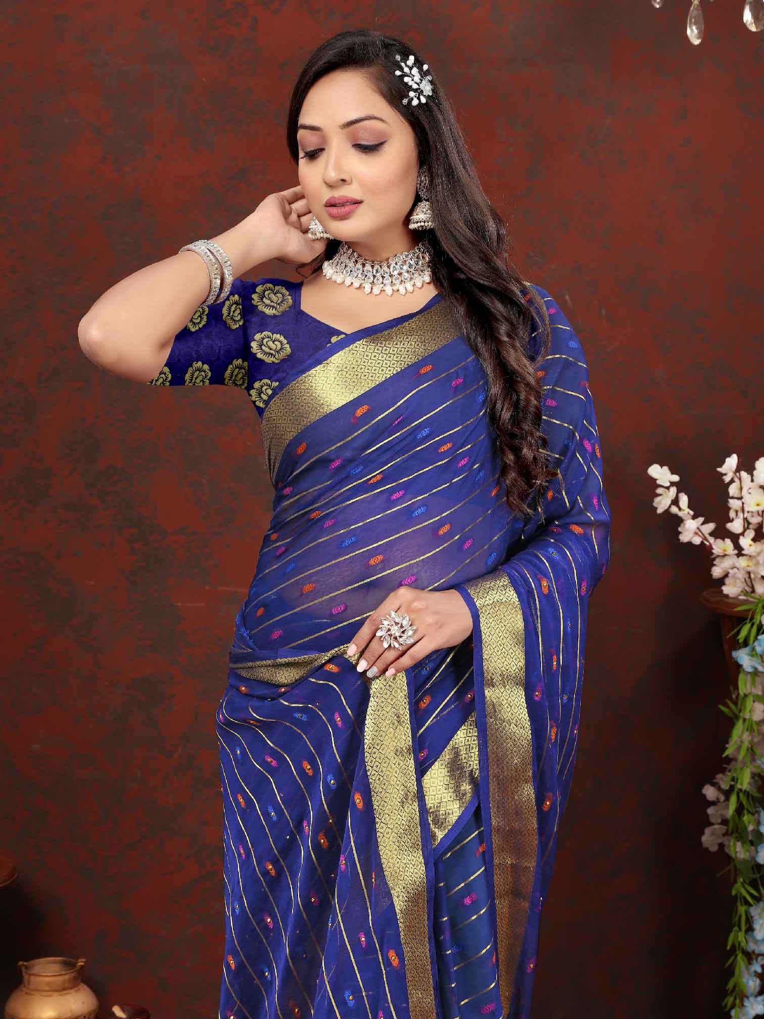 Chic Women's Party Wear Navy Blue Chiffon Saree with Woven Stripe Zari Border and Tassels - Elevate your style with this stunning ensemble! Perfect for special occasions, this saree features intricate zari detailing and playful tassels for a touch of elegance. Stand out from the crowd and make a statement in this luxurious saree. Don't miss out on adding this timeless piece to your wardrobe