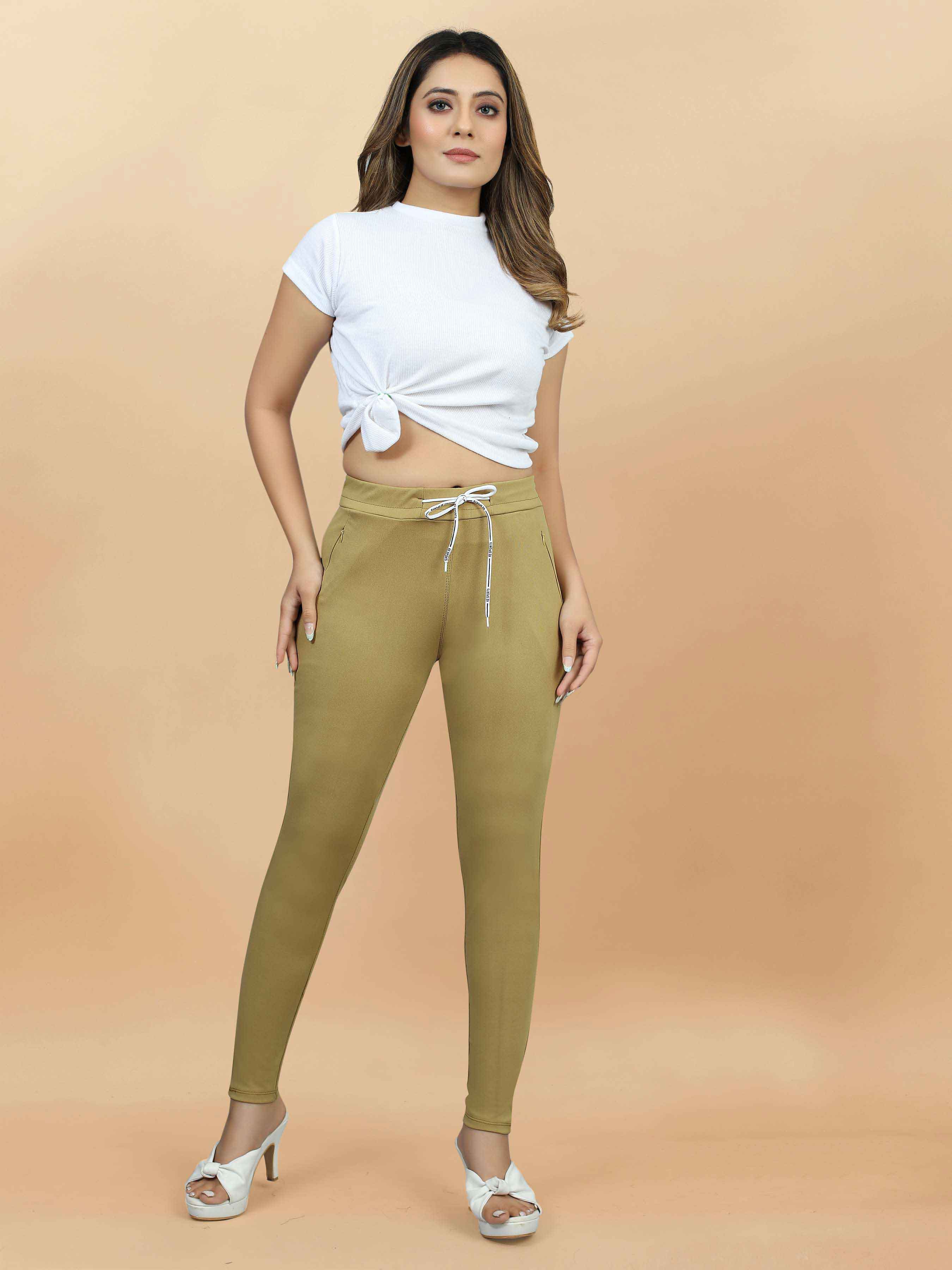 Stylish Women's Lycra Brown Jeggings with Front Pocket - Perfect blend of comfort and style for casual wear. Elevate your everyday look with these trendy jeggings! Available now at our store. Don't miss out on our latest collection of women's fashion essentials. Shop today