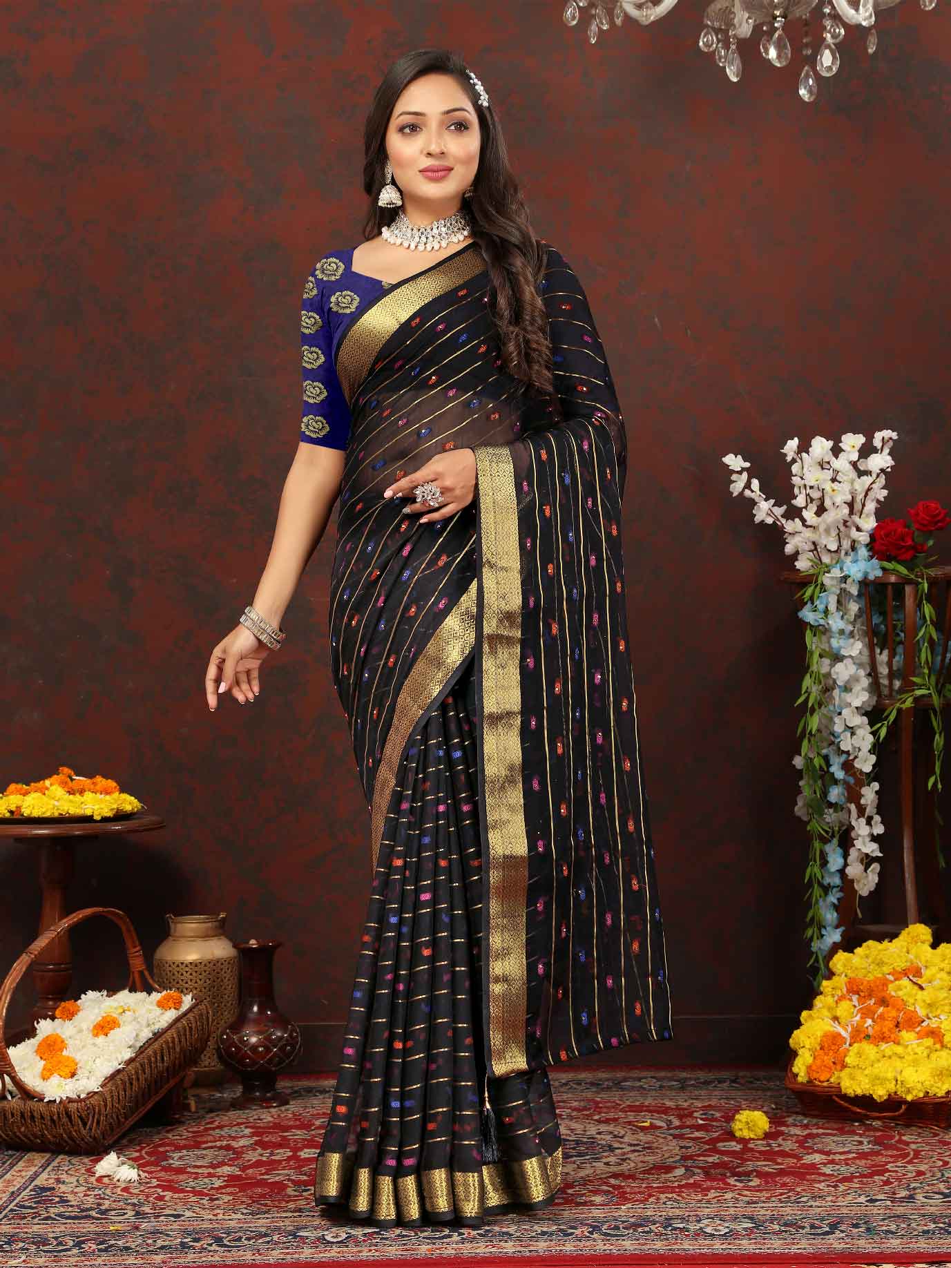 Elegant Women's Party Wear Black Chiffon Saree with Woven Stripe Zari Border and Tassels - Make a statement with this stunning ensemble! Perfect for special occasions, this saree features intricate zari detailing and playful tassels for a touch of glamour. Elevate your style and stand out from the crowd in this luxurious saree. Don't miss out on adding this timeless piece to your wardrobe!