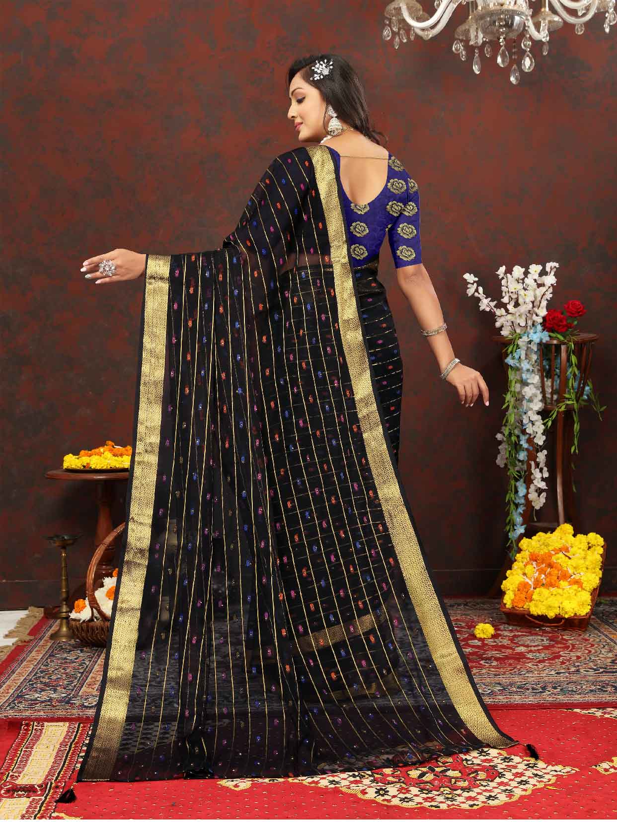 Elegant Women's Party Wear Black Chiffon Saree with Woven Stripe Zari Border and Tassels - Make a statement with this stunning ensemble! Perfect for special occasions, this saree features intricate zari detailing and playful tassels for a touch of glamour. Elevate your style and stand out from the crowd in this luxurious saree. Don't miss out on adding this timeless piece to your wardrobe!