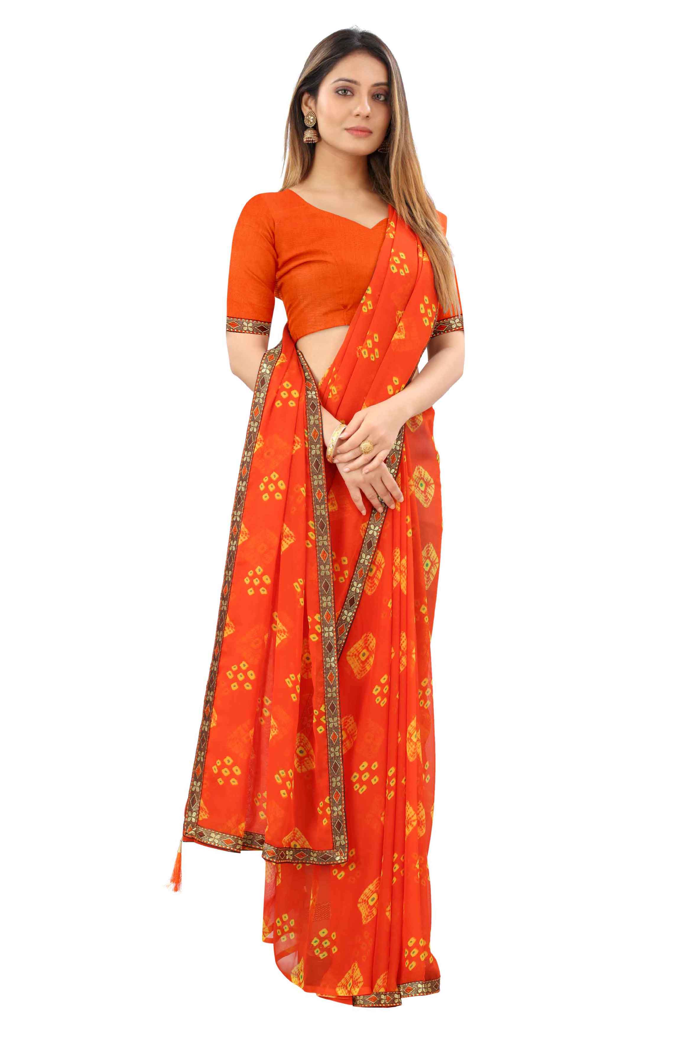 Women's Traditional Style Georgette Bandhani Printed Saree With Blouse - Elevate Your Ethnic Wardrobe with This Stunning Georgette Saree Featuring Intricate Bandhani Print. Effortlessly Blend Tradition with Modern Style for a Captivating Look That Turns Heads Wherever You Go. Ideal for Special Occasions, Parties, and Traditional Gatherings. Complete Your Ensemble with the Included Blouse for a Perfectly Coordinated Finish